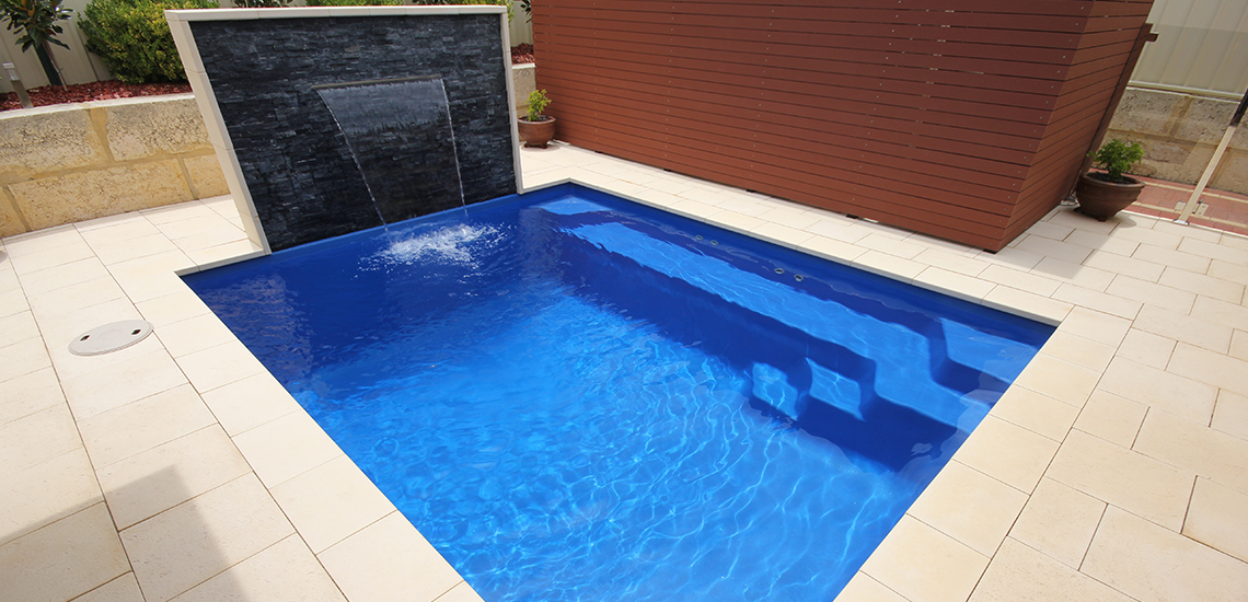 "Capri" Fibreglass Swimming Pool with "Cyber Blue" Pool Colour