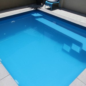 "Capri" Fibreglass Swimming Pool with "Pacific Blue" Pool Colour