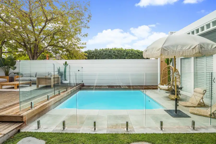 Compact fibreglass plunge pool in a small Perth backyard