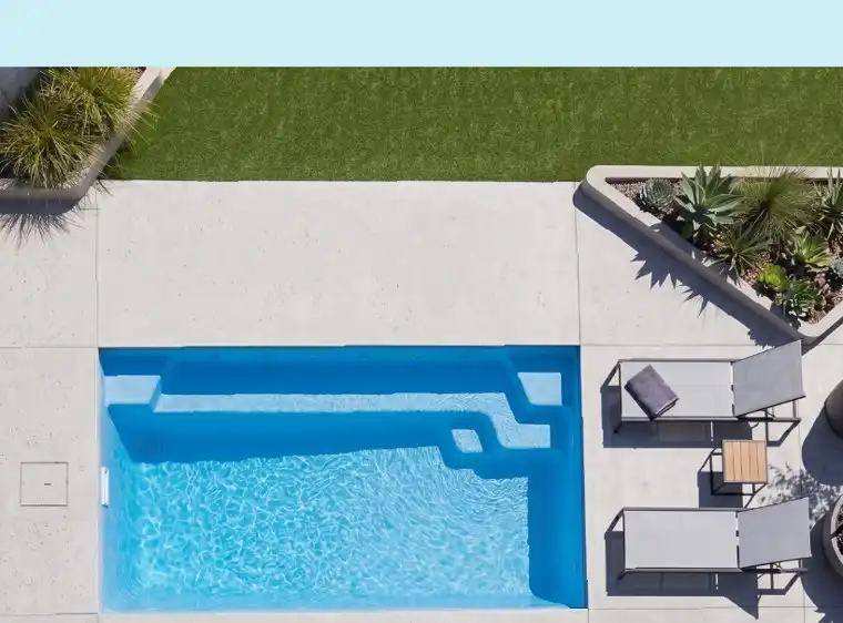 Aerial view of a compact Malta pool in a courtyard